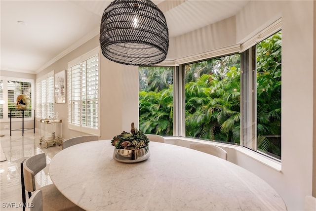 dining room with ornamental molding