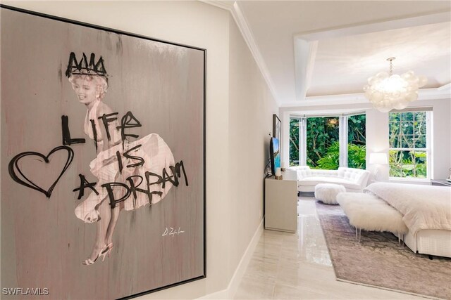 bedroom with crown molding and an inviting chandelier