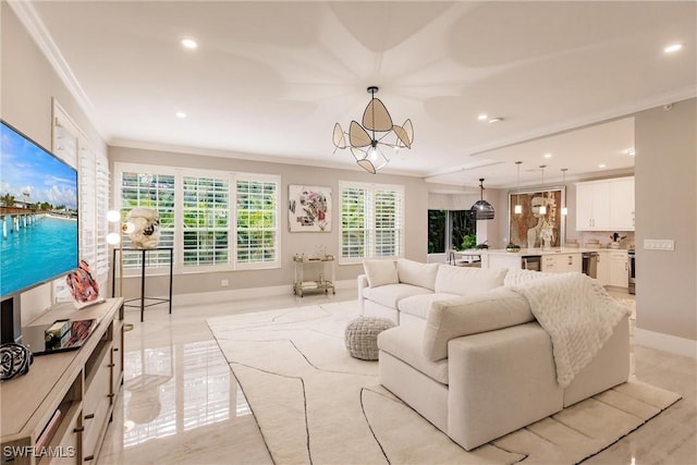 living room with an inviting chandelier, baseboards, crown molding, and recessed lighting