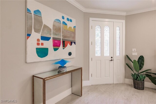 entryway featuring crown molding