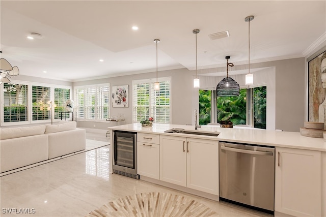 kitchen with wine cooler, dishwasher, pendant lighting, sink, and white cabinetry