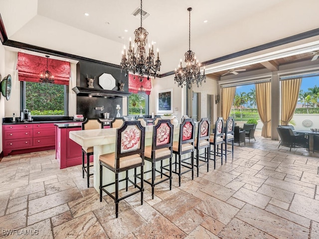 dining area featuring an inviting chandelier