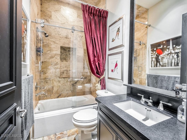 full bathroom featuring toilet, shower / bath combo with shower curtain, and vanity