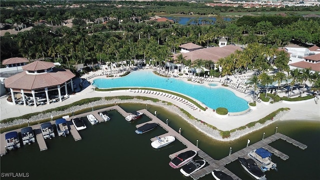 18281 Via Caprini Dr, Miromar Lakes, FL 33913 - view of property location featuring a pool area and a nearby body of water