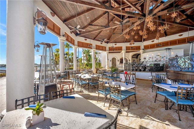 view of patio featuring ceiling fan