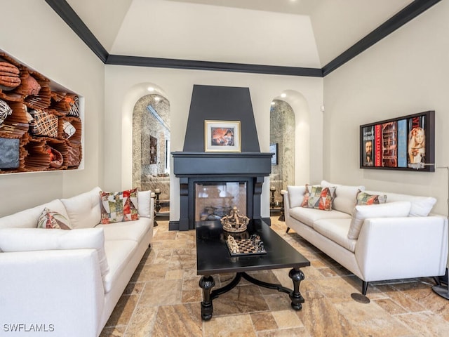 living room with high vaulted ceiling