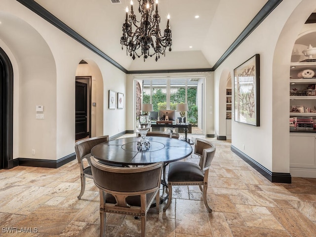 dining area featuring lofted ceiling and a notable chandelier