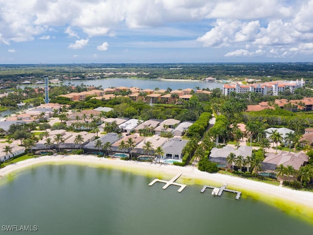 aerial view with a beach view and a water view