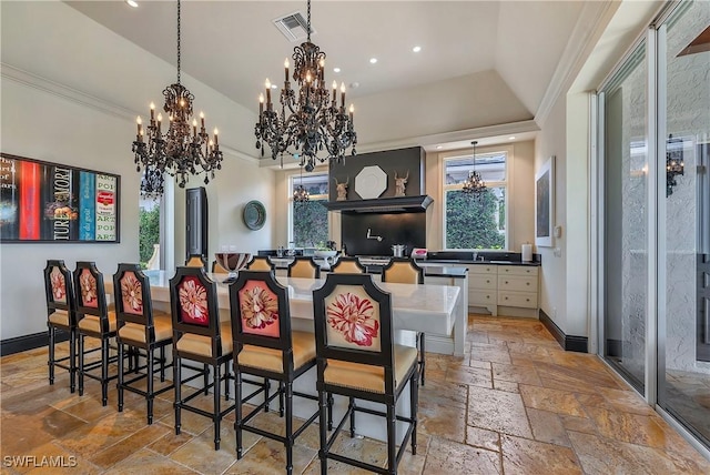 18281 Via Caprini Dr, Miromar Lakes, FL 33913 - bar with a chandelier, stone tile floors, plenty of natural light, crown molding, and recessed lighting