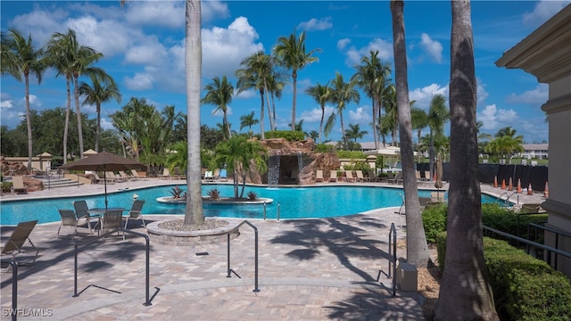 view of swimming pool featuring a patio area