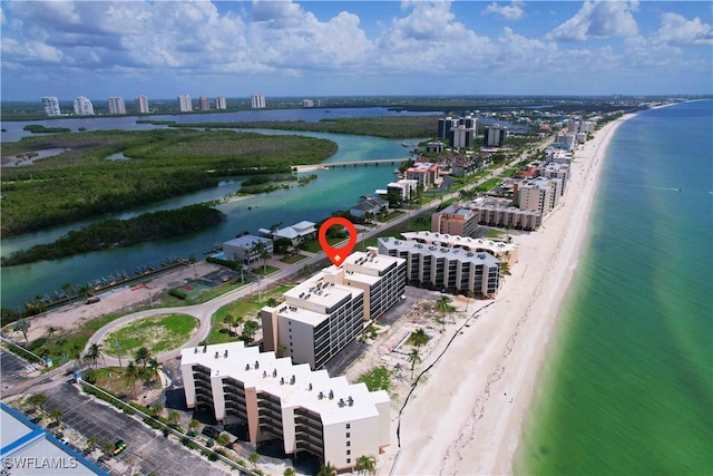 aerial view with a view of the beach and a water view