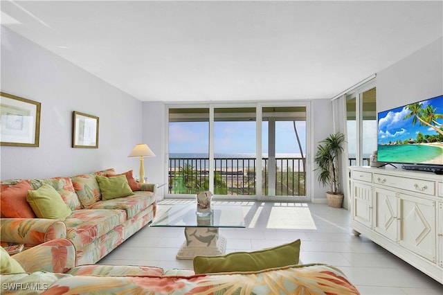 living room with plenty of natural light and floor to ceiling windows