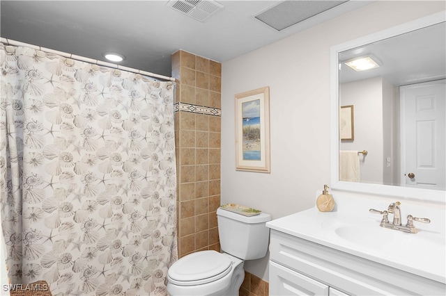 bathroom with walk in shower, toilet, and vanity