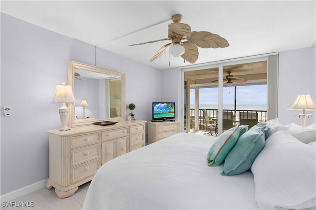 bedroom featuring ceiling fan and access to outside