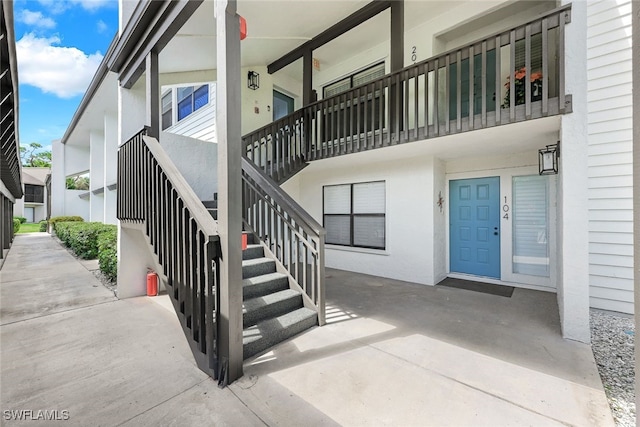 exterior space featuring stucco siding