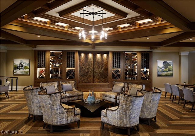 interior space featuring beam ceiling, coffered ceiling, baseboards, and an inviting chandelier