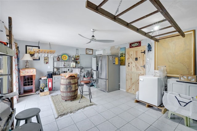 interior space featuring light tile patterned flooring and ceiling fan