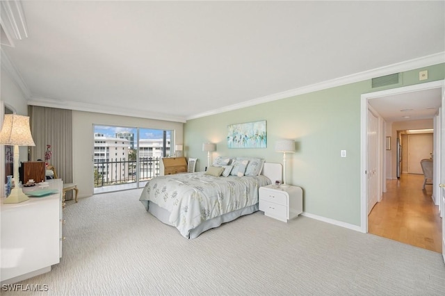 bedroom with visible vents, light carpet, crown molding, baseboards, and access to exterior