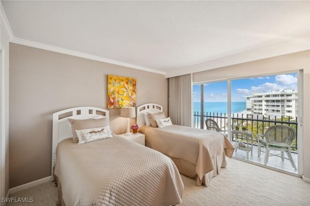 bedroom featuring baseboards, ornamental molding, a water view, access to outside, and carpet flooring