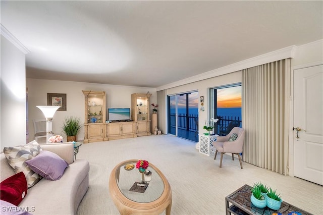 living room with crown molding and light carpet