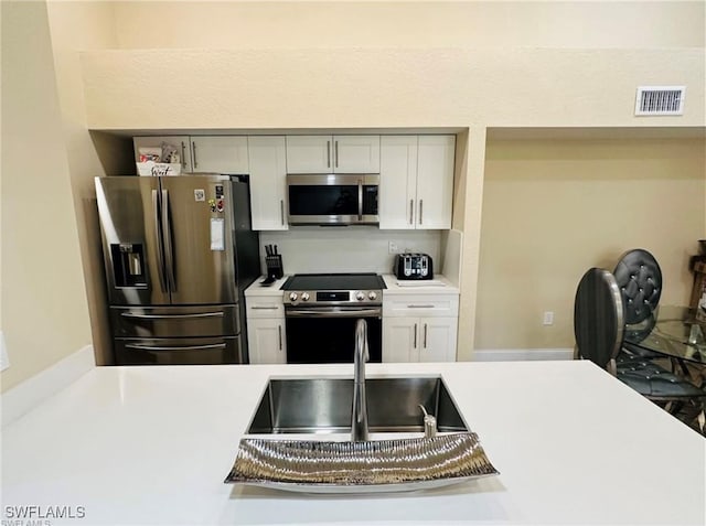 kitchen with stainless steel appliances and sink