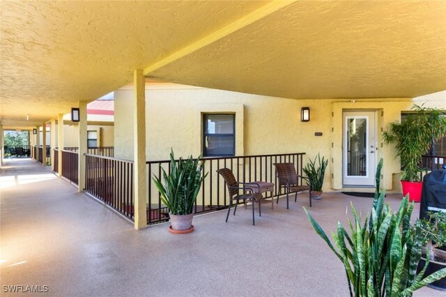 doorway to property with stucco siding