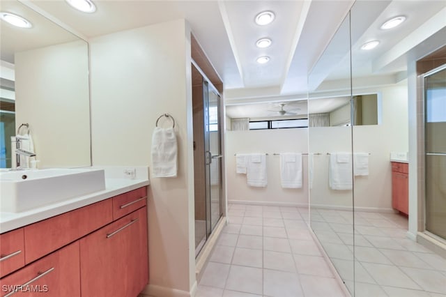 bathroom with vanity, an enclosed shower, ceiling fan, and tile patterned floors