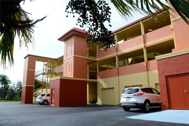 view of building exterior with an attached garage