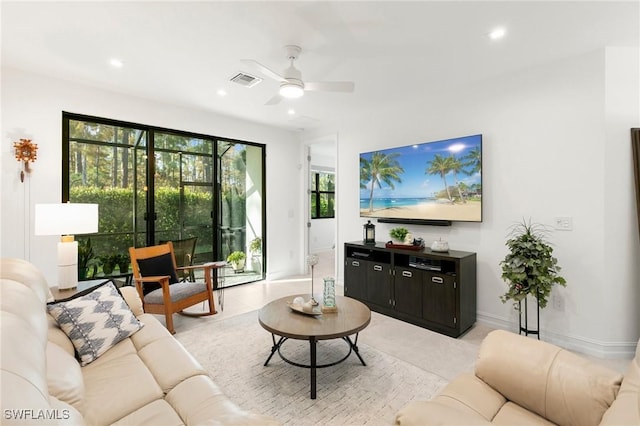 living room with ceiling fan