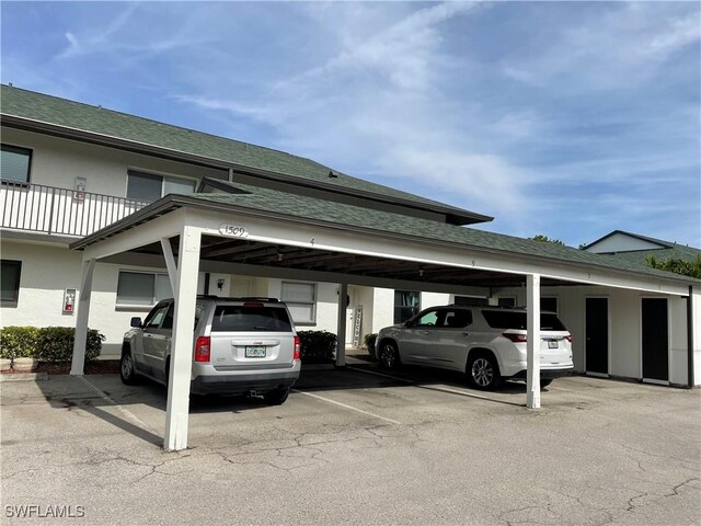 view of parking with a carport