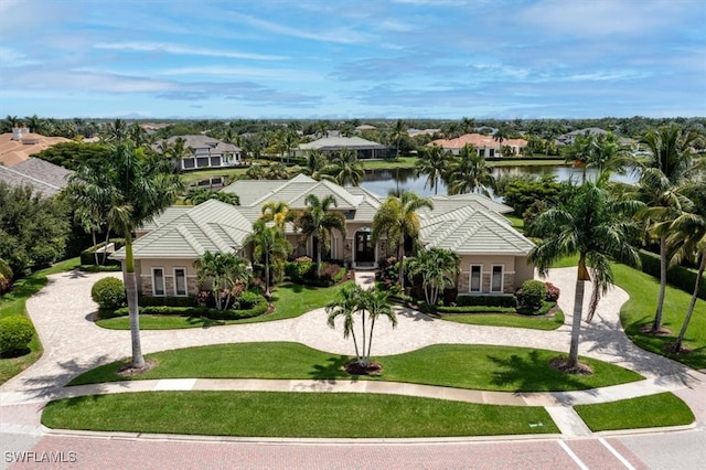 birds eye view of property featuring a water view