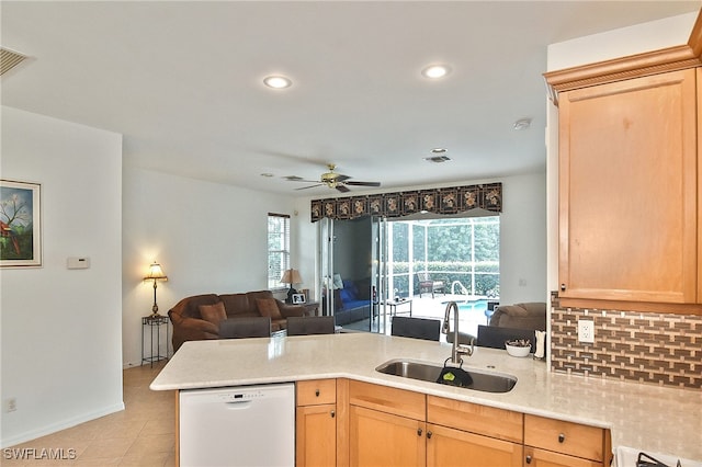 kitchen with dishwasher, light brown cabinetry, kitchen peninsula, sink, and ceiling fan