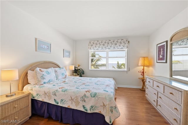 bedroom featuring hardwood / wood-style floors