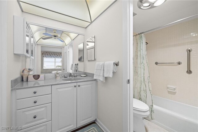 full bathroom with shower / bath combo, toilet, and vanity