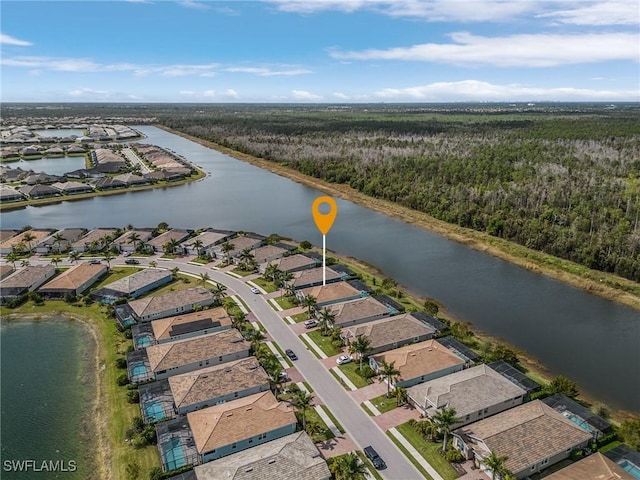 aerial view featuring a water view and a residential view