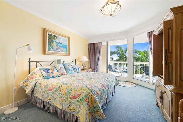 carpeted bedroom featuring access to outside and crown molding