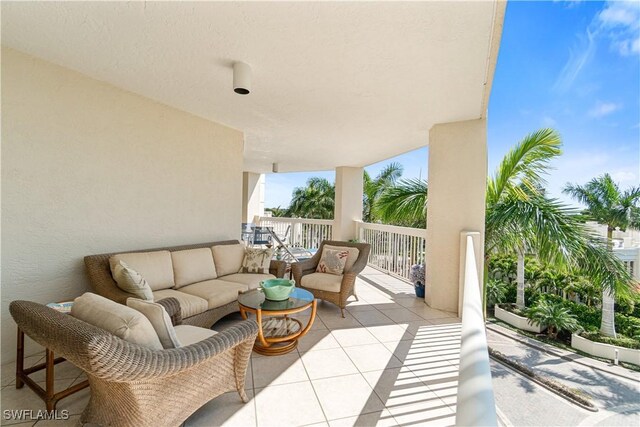 view of patio / terrace featuring a balcony and an outdoor living space