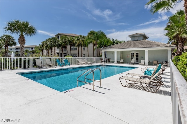 view of swimming pool featuring a patio area