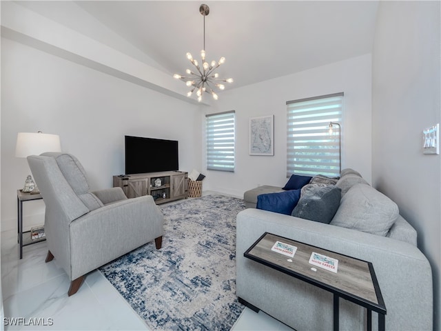 living room with lofted ceiling and a notable chandelier