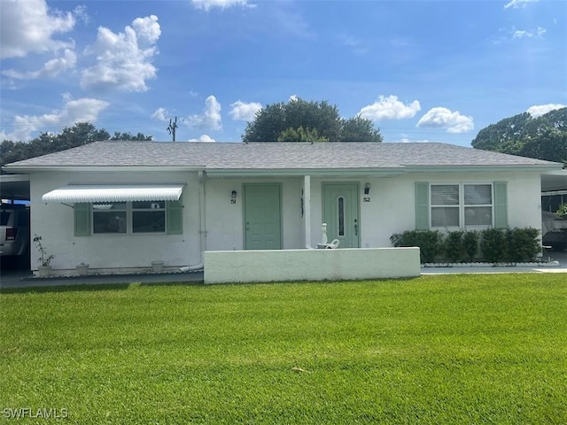 52 Heath Aster Ln, Lehigh Acres, FL 33936 - ranch-style home with a front lawn, stucco siding, and a shingled roof