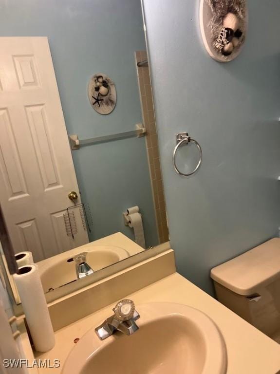 52 Heath Aster Ln, Lehigh Acres, FL 33936 - bathroom with vanity and toilet