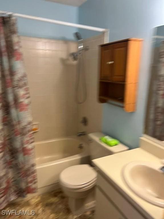 52 Heath Aster Ln, Lehigh Acres, FL 33936 - bathroom featuring vanity, shower / bath combination with curtain, and toilet