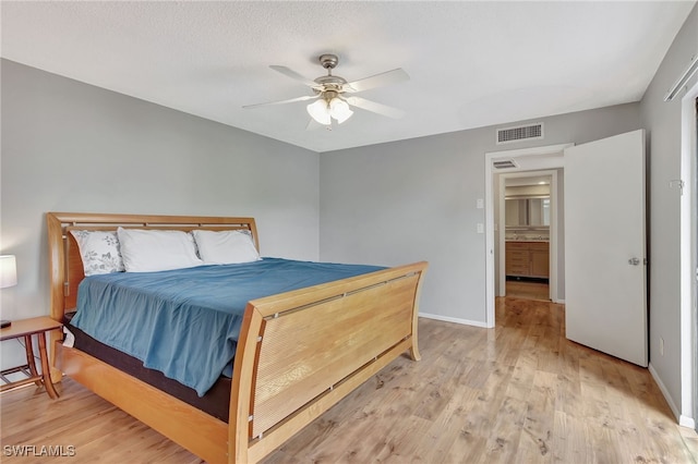 bedroom featuring ceiling fan and light hardwood / wood-style floors