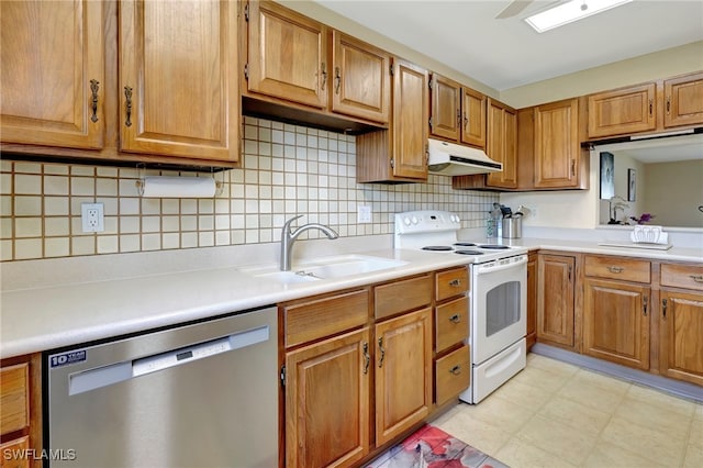 kitchen with dishwasher, backsplash, sink, and electric range