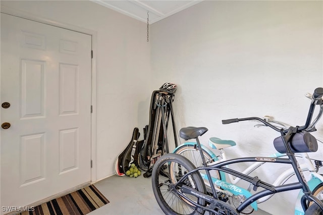 workout room featuring concrete floors