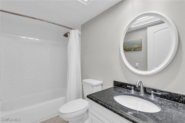 full bathroom with vanity, shower / bath combo with shower curtain, and toilet