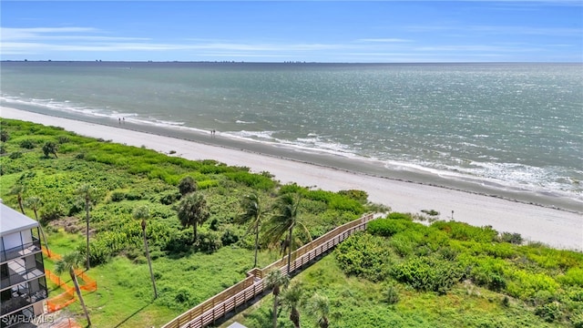 aerial view featuring a water view and a view of the beach