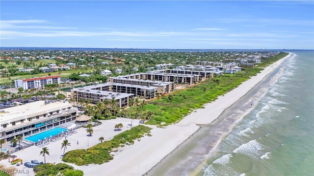 bird's eye view with a view of the beach and a water view