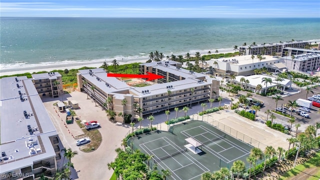 aerial view with a view of the beach and a water view