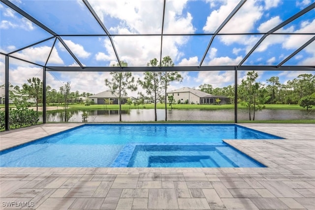 view of swimming pool with a water view, a patio, and glass enclosure